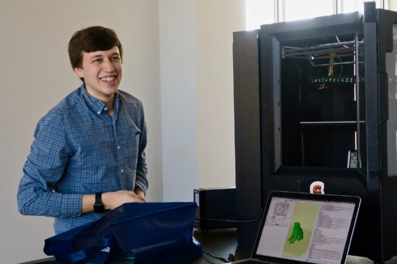 Evan Weinstein poses with his Cocoa Press chocolate printer.