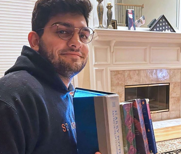Archit Dhar holds Harry Potter books