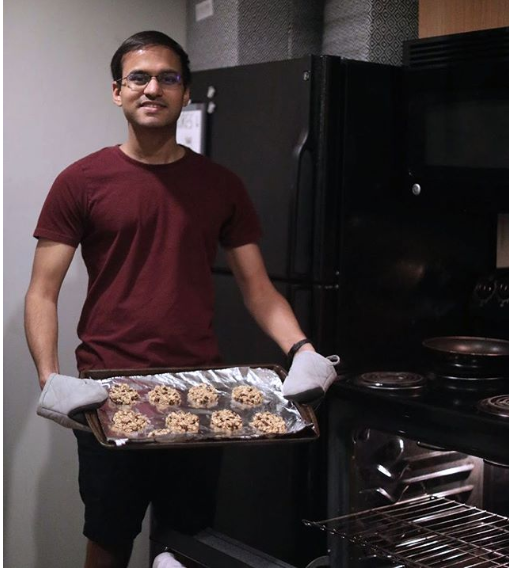 Vijay Ramanujan, senior in Mechanical Engineering and Applied Mechanics, bakes a batch of cookies 