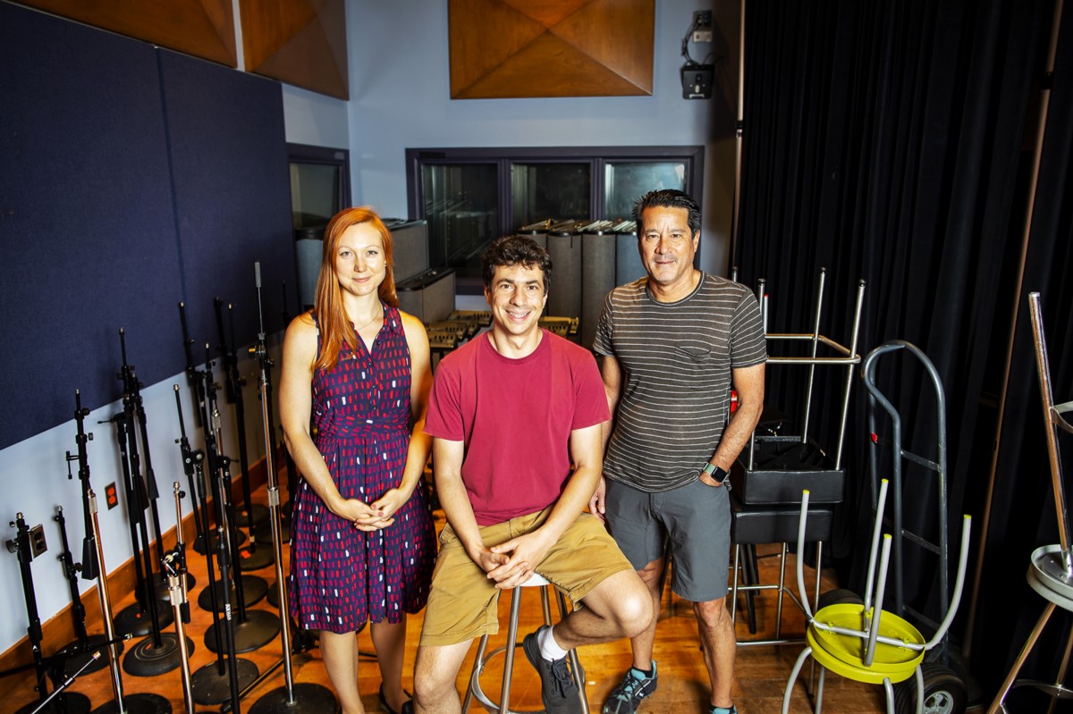 Lisa Miracchi, Aaron Roth and Michael Kearns sitting in a podcast studio.