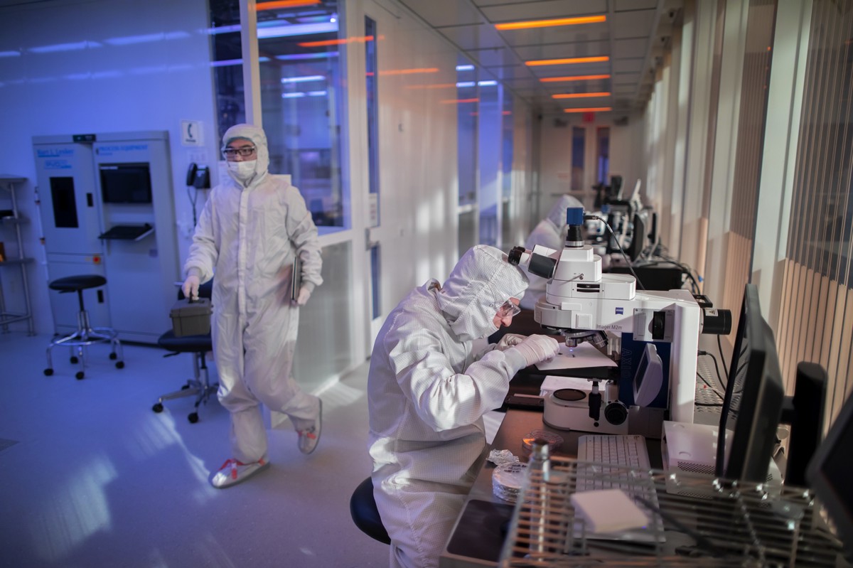 Singh Center researchers work in head-to-toe cleanroom suits.