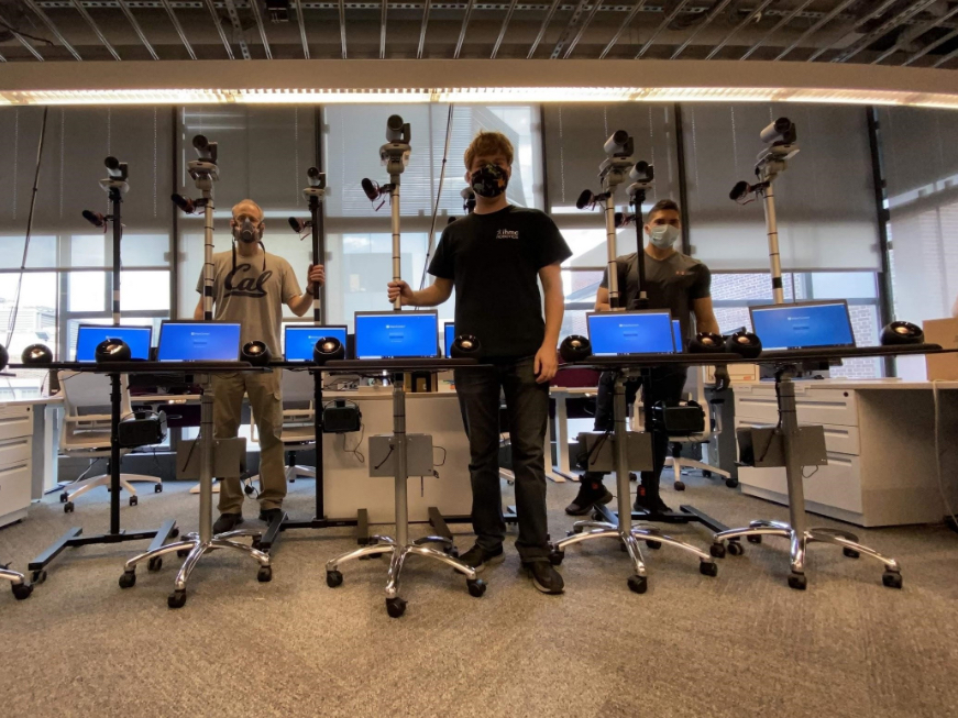 GRASP lab researchers (from left) Bernd Pfrommer, Kenneth Chaney, and Caio Mucchiani assembling telemedicine cart prototypes in Levine hall earlier this spring. (Image courtesy of Kenneth Chaney and Bernd Pfrommer)