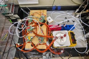 A tangle of circuit boards, wires and tubes that make up the researcher's "electronic nose."