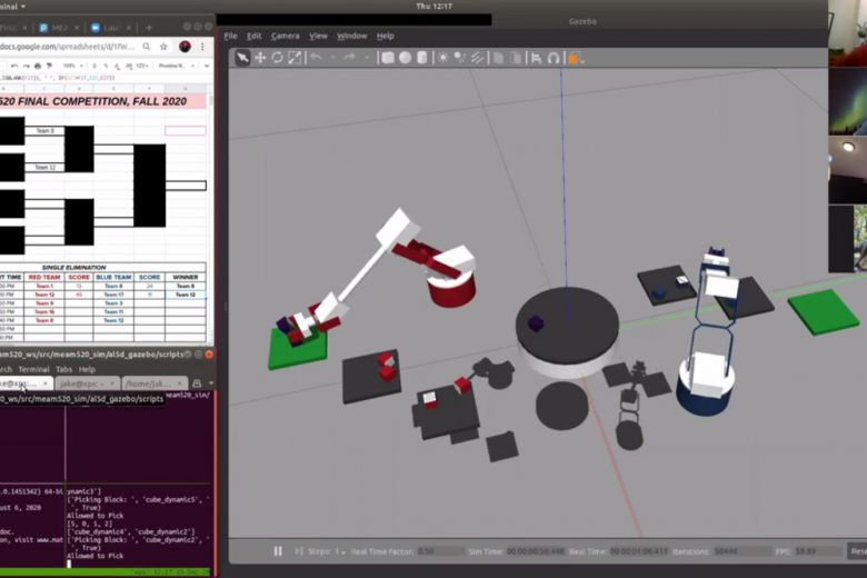 A screenshot from Sung's course, showing a competition between two virtual robotic arms.