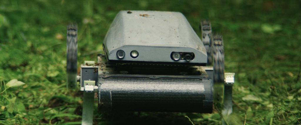 A close-up of the modified Kod*Lab robot known as Rhex as it appears in the film Lapsis.