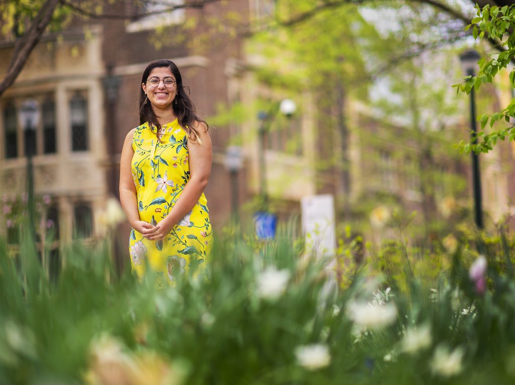 Yasmina Al Ghadban stands in front of the Towne Building