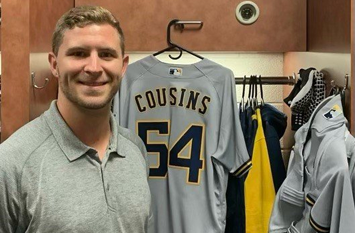 Jake Cousins poses in the locker room