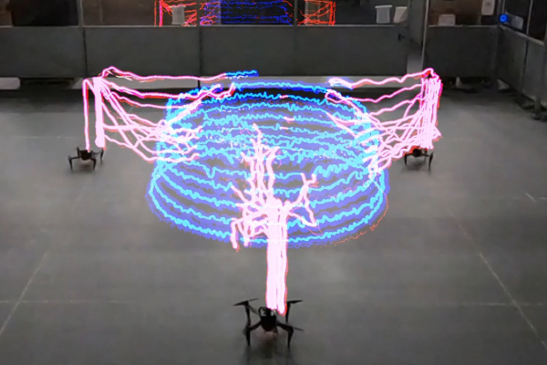 Timelapse photo showing swarm of flying robots 3D-printing a structure