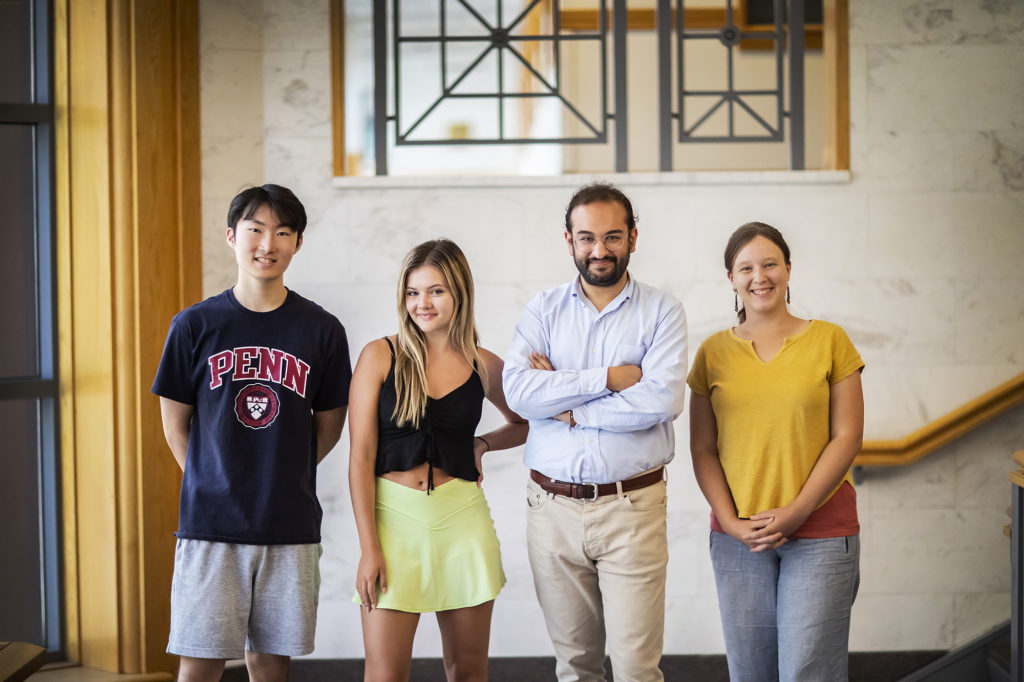 Researchers pose in a photo by Eric Sucar