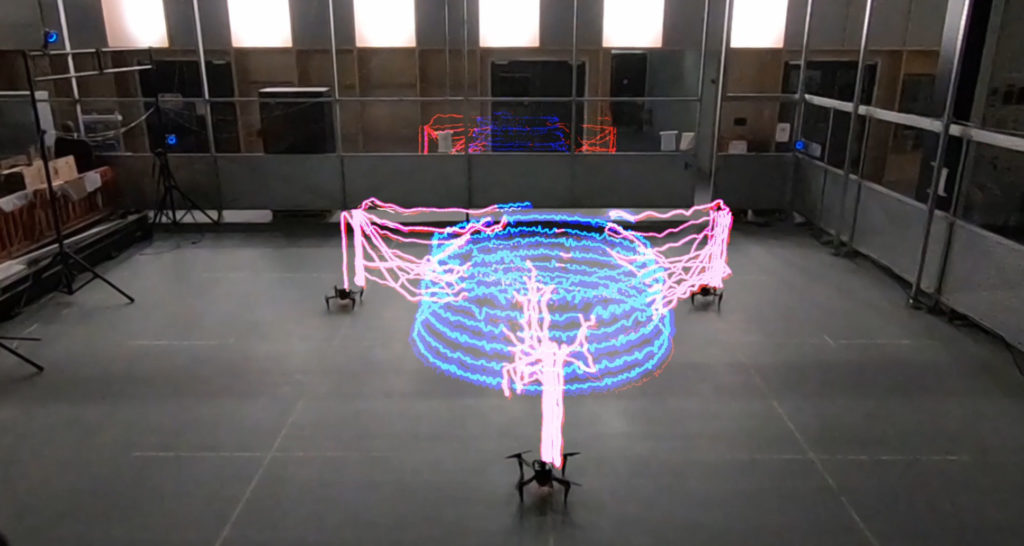 Timelapse photo showing swarm of flying robots 3D-printing a structure