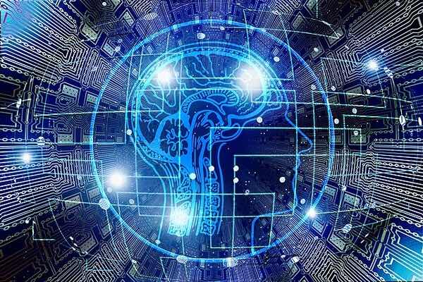 A human head and brain is lit up in electric blue circuit networks depicting an AI model.