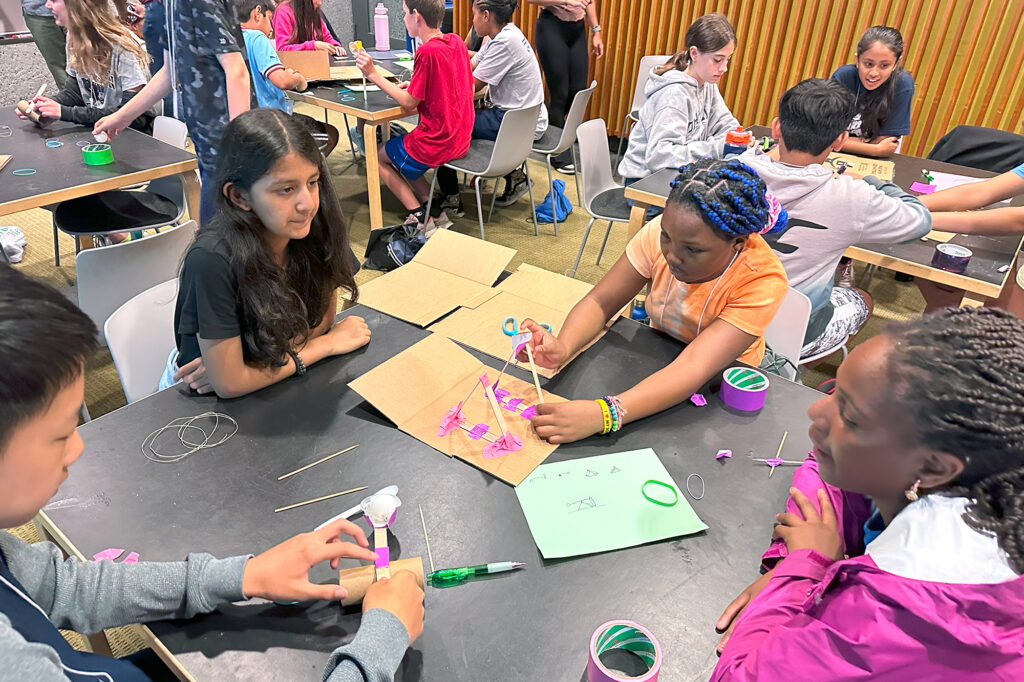 A team of GEMS campers working together on a group project. (Image: Courtesy of Penn Giving)