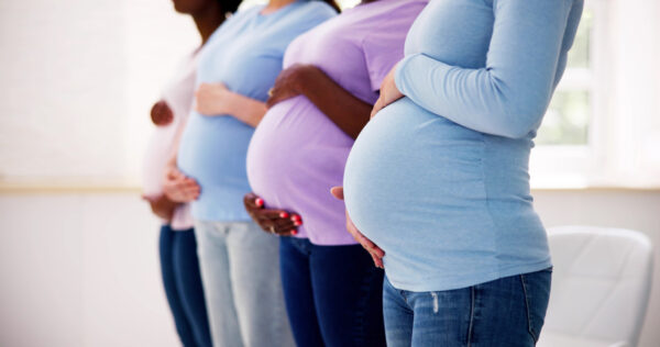 Pregnant Woman Group in a Row