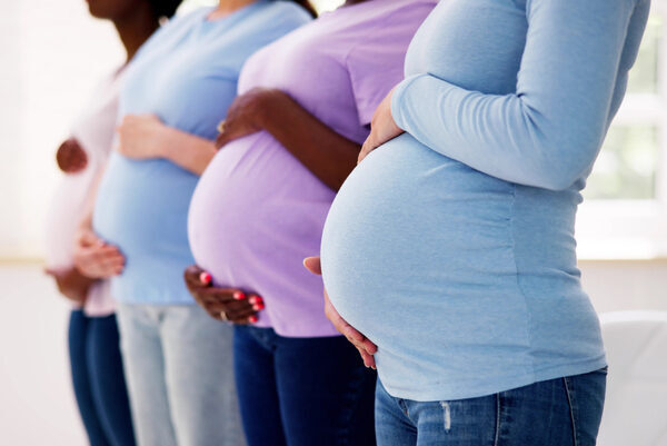 Pregnant Woman Group in a Row
