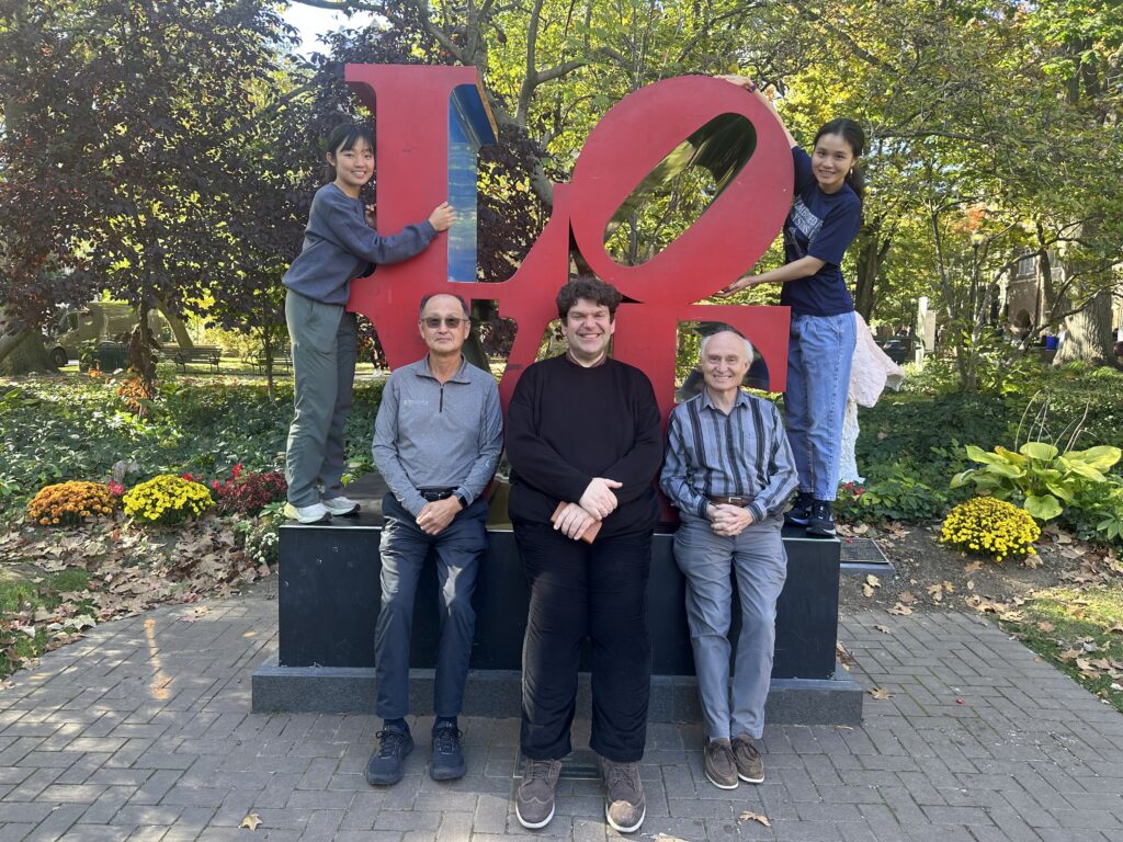 Students and Professors in front of the LOVE statue on Penn's campus. From left to righttop - Ahhyun Yuh (hugging the "L") and Xiayan Ji (hugging the "O") sitting - Insup Lee, George Demiris, Oleg Sokolsky