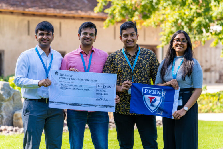 Rithwik Udayagiri, Pranav Shah, Aadith Kumar, and Sharon Shaji pose with their commemorative check for winning the SICK $10K Challenge. Photograph by: SICK’s Dschafar El Kassem.