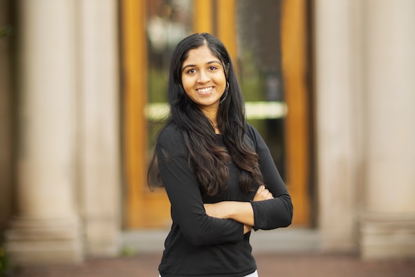 A portrait of Aashika Vishwanath in front of Towne Hall