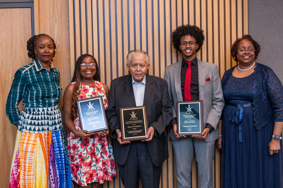 From left: Dr. Yulanda Essoka, GrEd'22, Associate Director of the Office of Diversity, Equity and Inclusion (ODEI); Anuoluwa Akibu, CIS'24, Program Chair of Penn NSBE; Coshburn, ChE'57; Abdinajib Mohamed, ESE'24, Vice President of Penn NSBE; Dr. Laura Stubbs, ME'79 GME'80, Senior Director of ODEI 