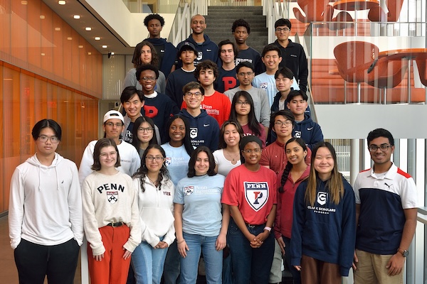 The Clark Scholars stand on the stairwell in the Singh Center for Nanotechnology