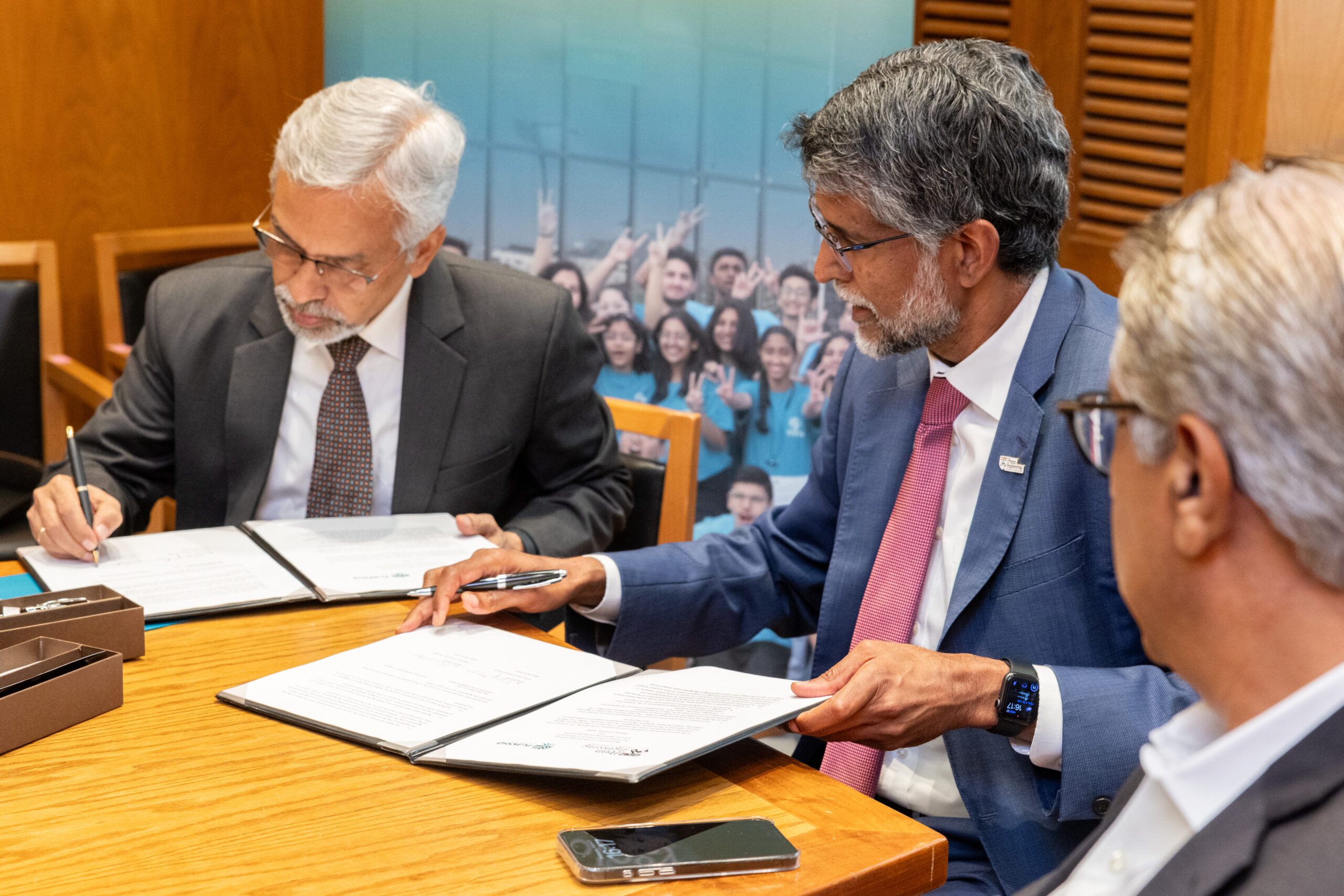 Rudra Pratap (left) and Vijay Kumar (right) at the signing ceremony.