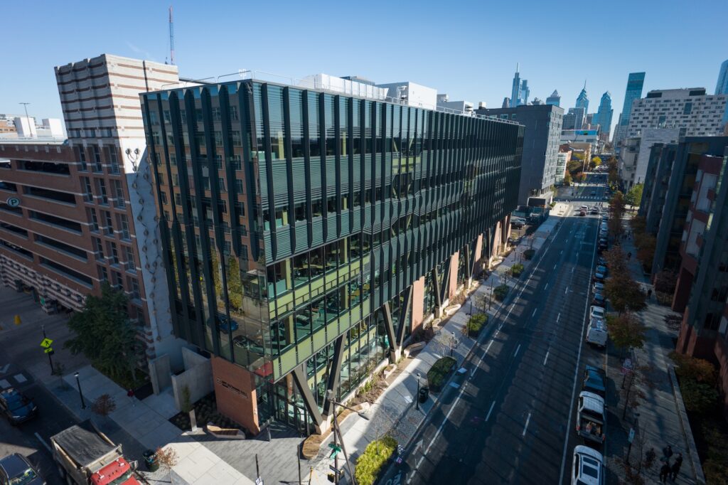 An aerial picture of Amy Gutmann Hall overlooking the city of Philadelphia.