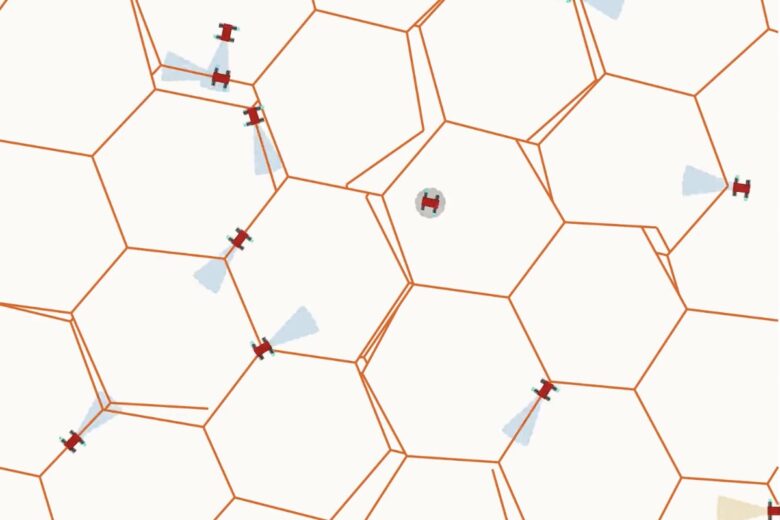 A lattice of honeycombs and tiny robots moving on top of it.