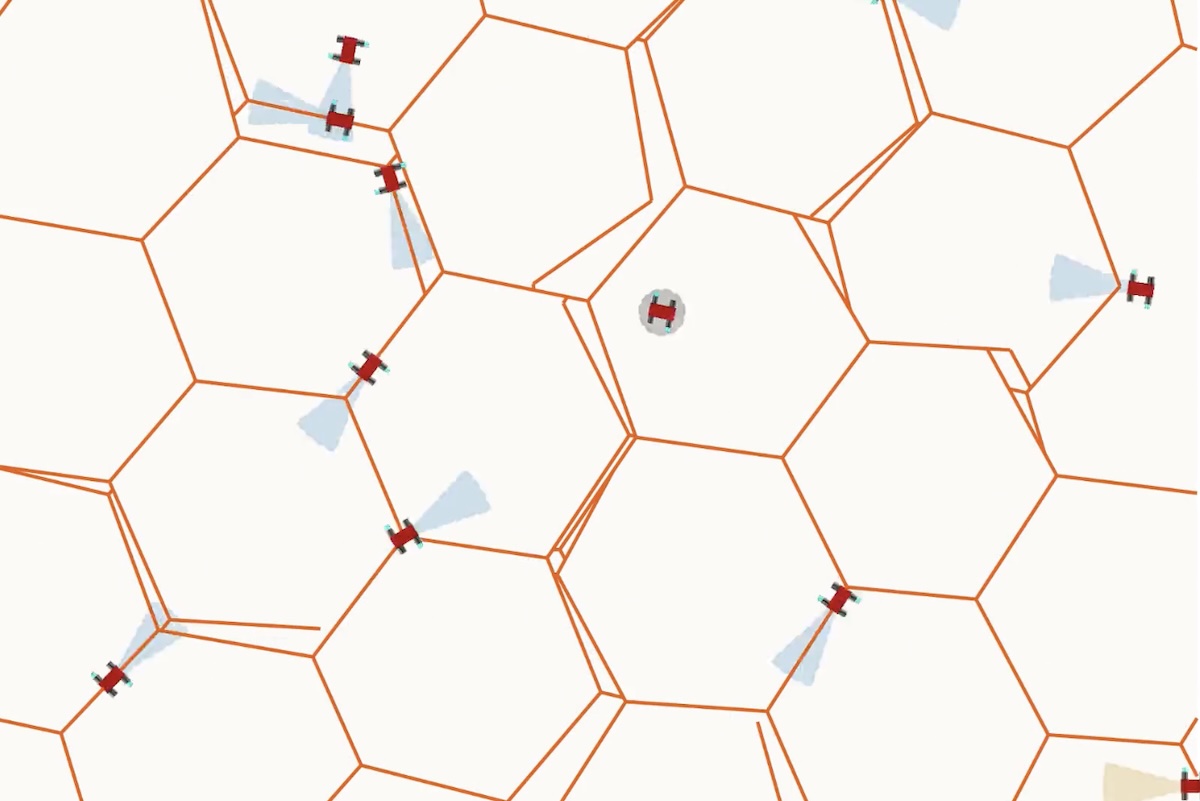 A lattice of honeycombs and tiny robots moving on top of it.