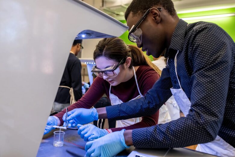 Penn students gain hands-on experience in scientific research through collaborative lab work—part of the University’s commitment to advancing STEM education and real-world discovery. (Image: Courtesy of Inspiring Impact Magazine)